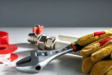 Plumbing tools, equipment and material for plumbing works. Place for text.