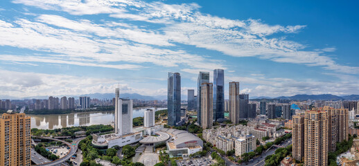 Obraz premium Panoramic View of Modern City with Skyscrapers