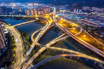 Aerial View of Urban Highway Interchange at Night