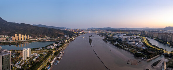Aerial Panoramic View of River City at Sunset