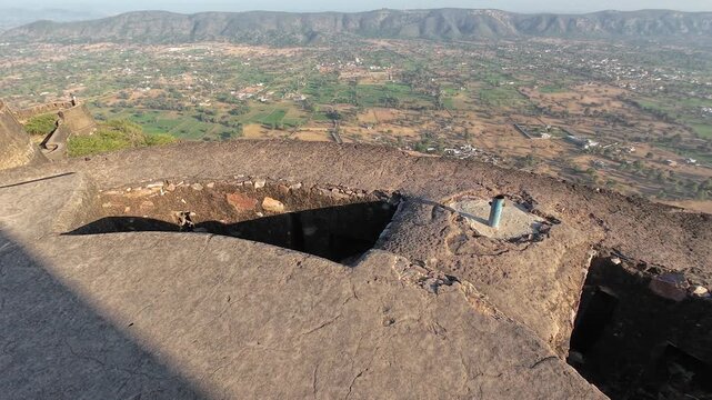 Exploring the Historic Fortress of Deogarh Featuring Weathered Stone Fortifications and Strategic Defensive Structures on a Rugged Hilltop Landmark, Sikar, Rajasthan