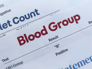 Getting Blood group report concept top view close up background.