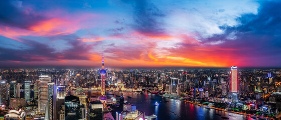 Aerial view of the modern city commercial buildings and skyline at night in Shanghai