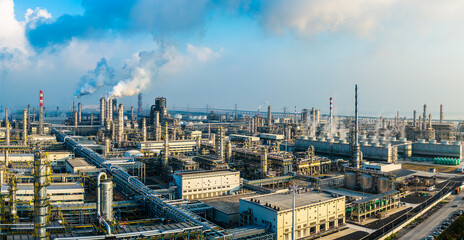 Aerial shot of a large chemical plant and oil refinery with pipeline equipment in industrial area