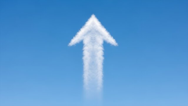 White cloud in the shape of an upward arrow pointing to the top against a clear bright blue sky background