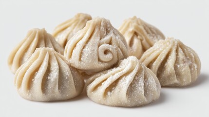 Freshly prepared khinkali dumplings, ready for cooking