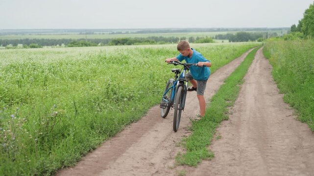 white boy standing with bicycle in meadow, field of wildflowers and distant horizon, smiling portrait with hands on handlebars, gentle ride along dirt path, carefree summer landscape vibe