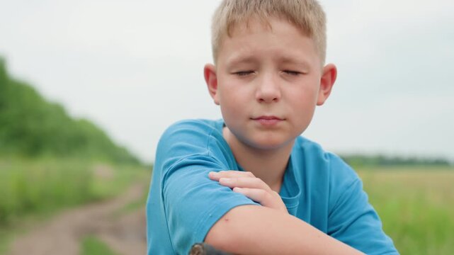 caucasian boy covering face in field, bicycle handle in foreground, overcast sky and winding track, brief breakdown then steadying gaze, raw emotion and quiet resilience, rural mood, soft natural