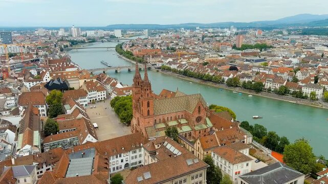 Basel, Switzerland. Basel Cathedral. Basel is a city on the Rhine River in northwestern Switzerland, near the borders with France and Germany. Drone footage, Point of interest