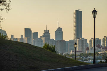 Fototapeta premium Urban Skyline With Tower In Warm Evening Light