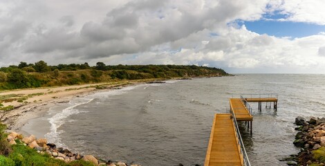 view of the bathhouse pier and the Galokken beach near Ronne on the west coast of Bornholm Island