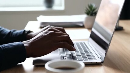 Close Up of Hands Typing on Laptop Keyboard