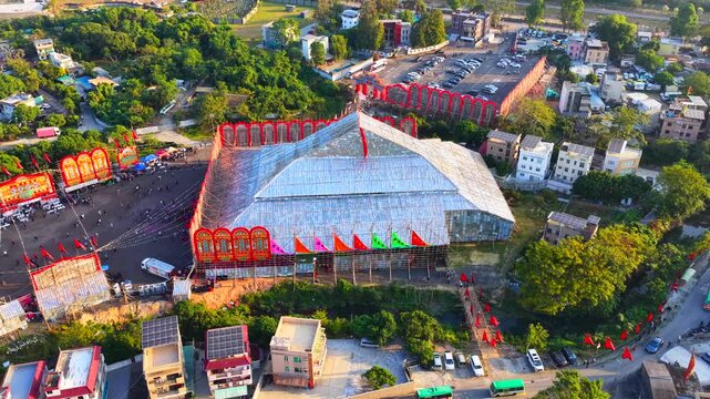 Kam Tin aerial dusk and daytime of the thanksgiving festival festival showcasing lanterns dragon lion and qilin dances traditional opera stages heritage rituals procession and village lights