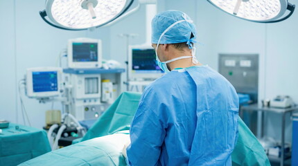 A surgeon performs a complex medical procedure in a state-of-the-art operating room, surrounded by advanced medical equipment and bright surgical lights.