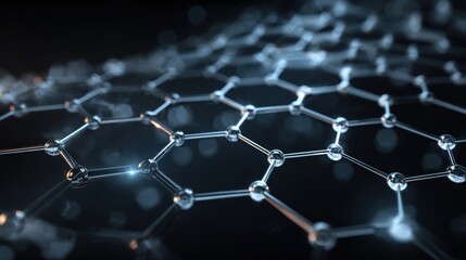 A close-up view of hexagonal molecular structures created by interconnected atoms. This shows advanced material science in a lab setting focused on modern research