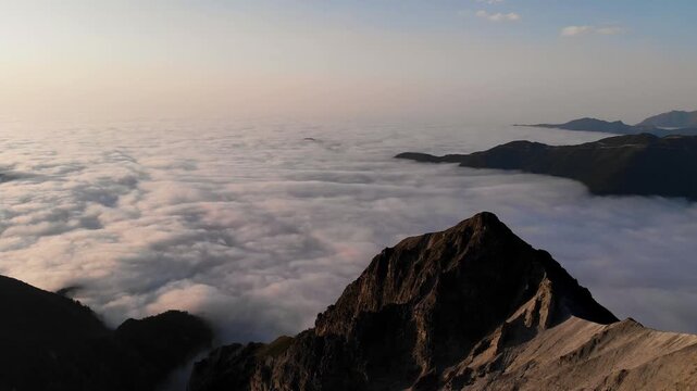 Aerial drone pan over sea of clouds in Rize Kackar Mountains, Turkey