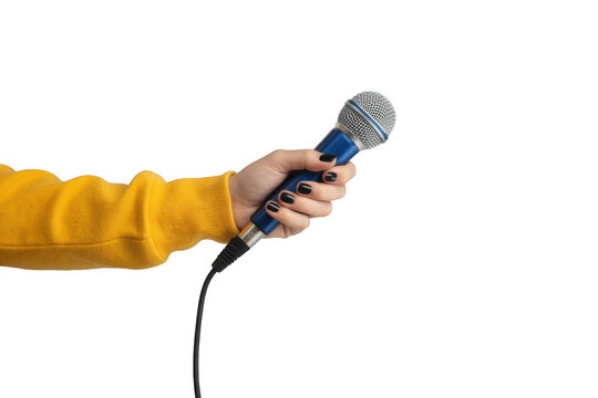 Hand holding blue microphone yellow sleeve black nails isolated on a transparent background