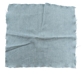 Piece of torn denim on a white background. Denim texture