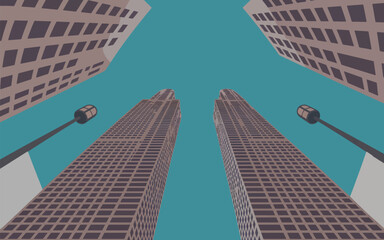Two tall buildings viewed from below against a teal sky