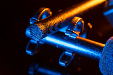 Close up on a professional boom microphone system on black background. © CesareFerrari