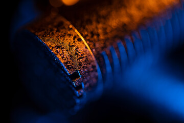 Close up on a professional boom microphone system on black background. © CesareFerrari