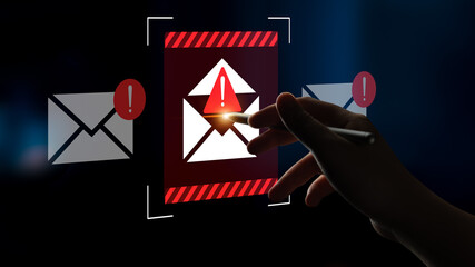 A hand activates an alert notification on a digital envelope symbolizing the urgency of email threats, highlighting important cybersecurity issues in contemporary communication. Gantry