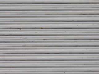 old white gray metal garage door