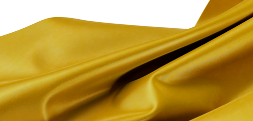 Close up shot of golden fabric with beautiful folds and elegant texture. Perfect for backgrounds and design projects.