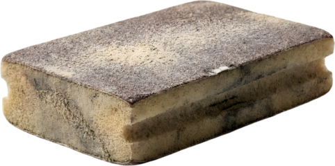 Used abrasive sanding sponge block isolated on white background perfect for carpentry diy renovation guides and surface preparation tutorial videos.