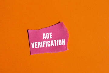 Age Verification message written on ripped torn paper background. Conceptual Age Verification...