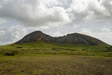 Rano Raraku volcano crater view on Easter Island under clouds