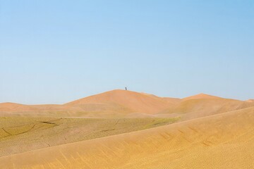 Fototapeta premium Sand Dunes Landscape with Single Hiker Silhouette