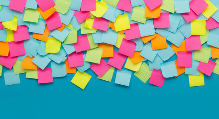 Bright Colorful Sticky Notes Scattered on Blue Background with Copy Space
