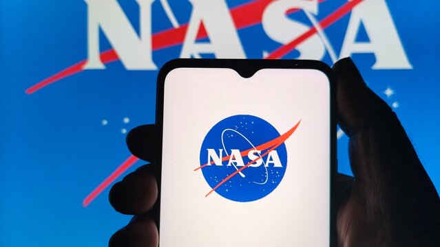 NASA logo on smartphone screen with hand holding device