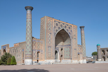 The ancient Ulugbek Madrasah on Registan Square on a sunny September day. The historical center of Samarkand