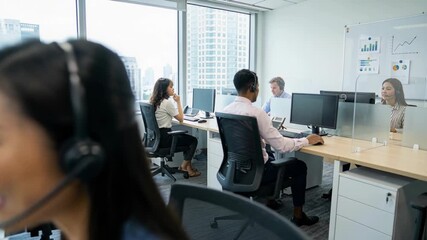 Diverse Team Working in Bright Modern Call Center with City Views Diverse Customer Service Representatives Talking on Headsets at Desks - Powered by Adobe