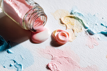 Artistic Arrangement of Spilled Paint in Soft Colors