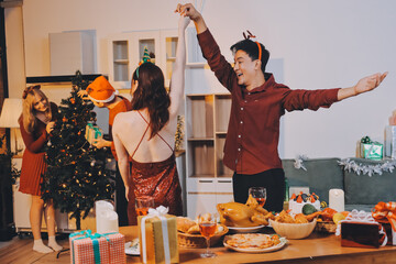 Festive Office Christmas Party with Delicious Food. A beautifully decorated office space with Christmas trees and festive lights, set up for a holiday party.