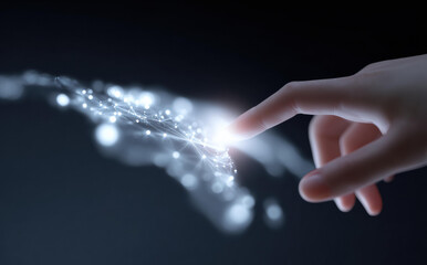 Futuristic hand touching digital network connection with glowing light particles on dark background showing innovation and discovery feeling for modern technology concept