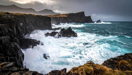 Dramatic ocean waves crashing against rugged cliffs under a stormy sky, showcasing the raw power of nature.