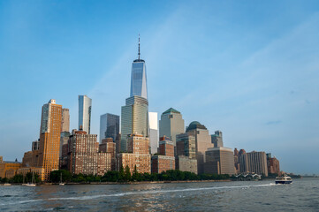 Obraz premium Panorama of Manhattan skyscrapers. Wide aerial view of Manhattan skyscrapers stretching along the Hudson River.