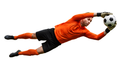 Soccer goalkeeper in orange jersey diving to catch the ball in mid air isolated on transparent background