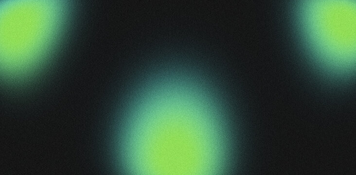 Yellow green abstract color texture glowing softly with highlights on black grainy backdrop