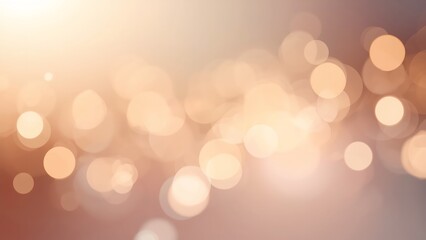 Soft peach and gold bokeh lights abstract background with warm glow and blurred circles