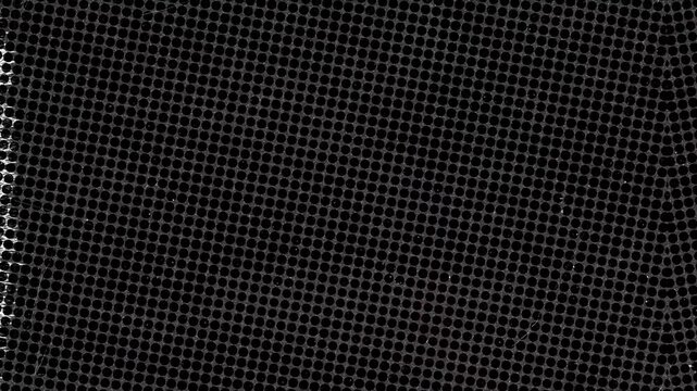 Close up of black perforated metal sheet pattern
