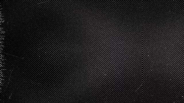 Black fabric texture close-up shot in Studio during daytime