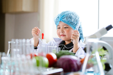 Asian little cute girl students. Girl doing science experiment science classroom. Education research and development concept learning kids.