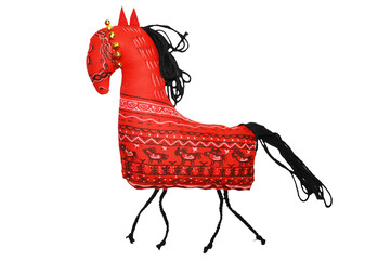 A majestic red horse with a thick black mane stands out against a clean white background © Fotograf