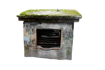 A small window with a mossy roof, offering a glimpse into a cozy interior