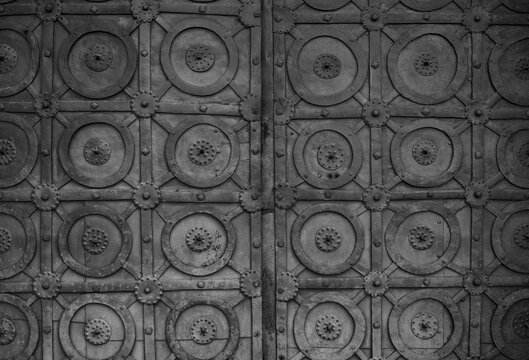Iron metal forged door on the street